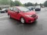 2016 Red /Black Honda Fit LX CVT (JHMGK5H55GX) with an 1.5L I4 SOHC 16V engine, Automatic transmission, located at 11115 Chardon Rd. , Chardon, OH, 44024, (440) 214-9705, 41.580246, -81.241943 - This One Owner 2016 Honda Fit LX is a practical and efficient subcompact hatchback powered by a 1.5L inline-4 engine, delivering impressive fuel economy of up to 40 MPG on the highway. It features a 5.0" center screen, backup camera, daytime running lights, ECO mode for enhanced efficiency, and spor - Photo#2