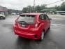 2016 Red /Black Honda Fit LX CVT (JHMGK5H55GX) with an 1.5L I4 SOHC 16V engine, Automatic transmission, located at 11115 Chardon Rd. , Chardon, OH, 44024, (440) 214-9705, 41.580246, -81.241943 - This One Owner 2016 Honda Fit LX is a practical and efficient subcompact hatchback powered by a 1.5L inline-4 engine, delivering impressive fuel economy of up to 40 MPG on the highway. It features a 5.0" center screen, backup camera, daytime running lights, ECO mode for enhanced efficiency, and spor - Photo#7