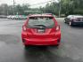 2016 Red /Black Honda Fit LX CVT (JHMGK5H55GX) with an 1.5L I4 SOHC 16V engine, Automatic transmission, located at 11115 Chardon Rd. , Chardon, OH, 44024, (440) 214-9705, 41.580246, -81.241943 - This One Owner 2016 Honda Fit LX is a practical and efficient subcompact hatchback powered by a 1.5L inline-4 engine, delivering impressive fuel economy of up to 40 MPG on the highway. It features a 5.0" center screen, backup camera, daytime running lights, ECO mode for enhanced efficiency, and spor - Photo#8