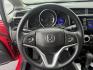 2016 Red /Black Honda Fit LX CVT (JHMGK5H55GX) with an 1.5L I4 SOHC 16V engine, Automatic transmission, located at 11115 Chardon Rd. , Chardon, OH, 44024, (440) 214-9705, 41.580246, -81.241943 - This One Owner 2016 Honda Fit LX is a practical and efficient subcompact hatchback powered by a 1.5L inline-4 engine, delivering impressive fuel economy of up to 40 MPG on the highway. It features a 5.0" center screen, backup camera, daytime running lights, ECO mode for enhanced efficiency, and spor - Photo#20