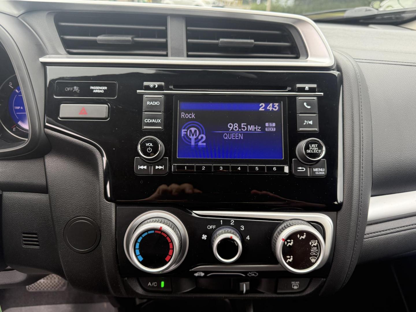 2016 Red /Black Honda Fit LX CVT (JHMGK5H55GX) with an 1.5L I4 SOHC 16V engine, Automatic transmission, located at 11115 Chardon Rd. , Chardon, OH, 44024, (440) 214-9705, 41.580246, -81.241943 - This One Owner 2016 Honda Fit LX is a practical and efficient subcompact hatchback powered by a 1.5L inline-4 engine, delivering impressive fuel economy of up to 40 MPG on the highway. It features a 5.0" center screen, backup camera, daytime running lights, ECO mode for enhanced efficiency, and spor - Photo#21