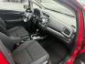 2016 Red /Black Honda Fit LX CVT (JHMGK5H55GX) with an 1.5L I4 SOHC 16V engine, Automatic transmission, located at 11115 Chardon Rd. , Chardon, OH, 44024, (440) 214-9705, 41.580246, -81.241943 - This One Owner 2016 Honda Fit LX is a practical and efficient subcompact hatchback powered by a 1.5L inline-4 engine, delivering impressive fuel economy of up to 40 MPG on the highway. It features a 5.0" center screen, backup camera, daytime running lights, ECO mode for enhanced efficiency, and spor - Photo#32