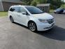 2014 White /Gray Honda Odyssey Touring Elite (5FNRL5H91EB) with an 3.5L V6 SOHC 24V engine, 6-Speed Automatic transmission, located at 11115 Chardon Rd. , Chardon, OH, 44024, (440) 214-9705, 41.580246, -81.241943 - This 2014 Honda Odyssey Touring Elite is a well-equipped minivan featuring a 3.5-liter V6 engine paired with a 6-speed automatic transmission, offering smooth performance and reliable power. It boasts a luxurious leather interior with power and heated front seats, tri-zone automatic climate control - Photo#2