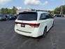 2014 White /Gray Honda Odyssey Touring Elite (5FNRL5H91EB) with an 3.5L V6 SOHC 24V engine, 6-Speed Automatic transmission, located at 11115 Chardon Rd. , Chardon, OH, 44024, (440) 214-9705, 41.580246, -81.241943 - This 2014 Honda Odyssey Touring Elite is a well-equipped minivan featuring a 3.5-liter V6 engine paired with a 6-speed automatic transmission, offering smooth performance and reliable power. It boasts a luxurious leather interior with power and heated front seats, tri-zone automatic climate control - Photo#7