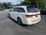 2014 White /Gray Honda Odyssey Touring Elite (5FNRL5H91EB) with an 3.5L V6 SOHC 24V engine, 6-Speed Automatic transmission, located at 11115 Chardon Rd. , Chardon, OH, 44024, (440) 214-9705, 41.580246, -81.241943 - This 2014 Honda Odyssey Touring Elite is a well-equipped minivan featuring a 3.5-liter V6 engine paired with a 6-speed automatic transmission, offering smooth performance and reliable power. It boasts a luxurious leather interior with power and heated front seats, tri-zone automatic climate control - Photo#9