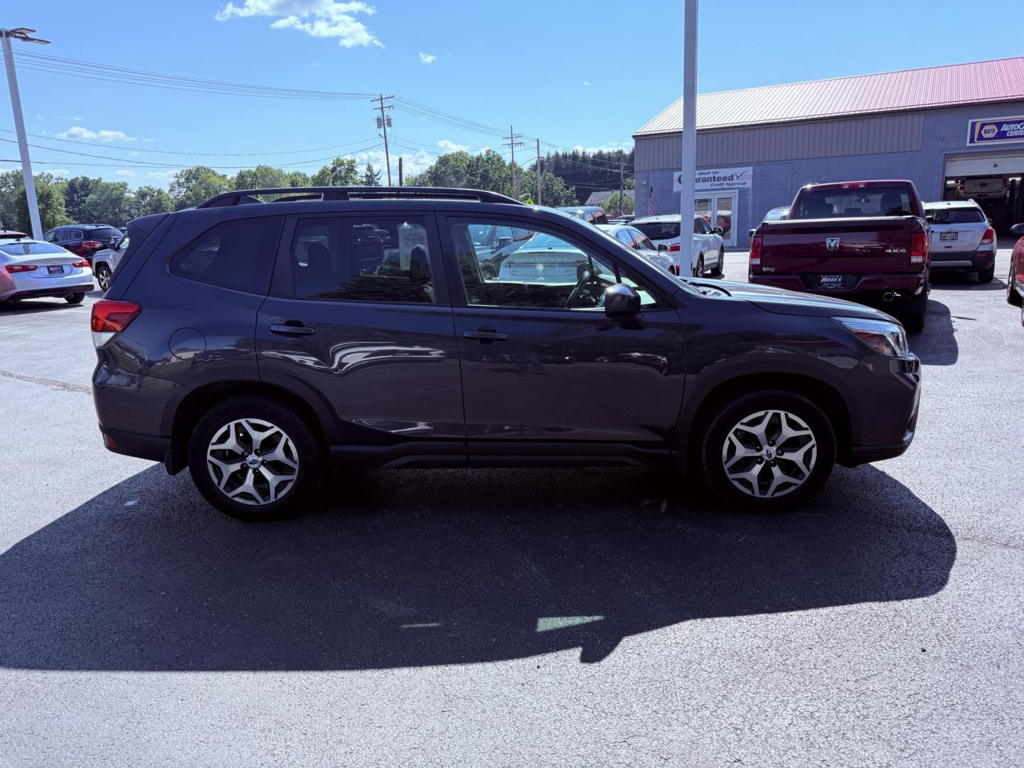 2019 Gray /Black Subaru Forester Premium (JF2SKAEC0KH) with an 2.5L H4 DOHC 16V engine, Automatic transmission, located at 547 E. Main St., Orwell, OH, 44076, (440) 437-5893, 41.535435, -80.847855 - Photo#5