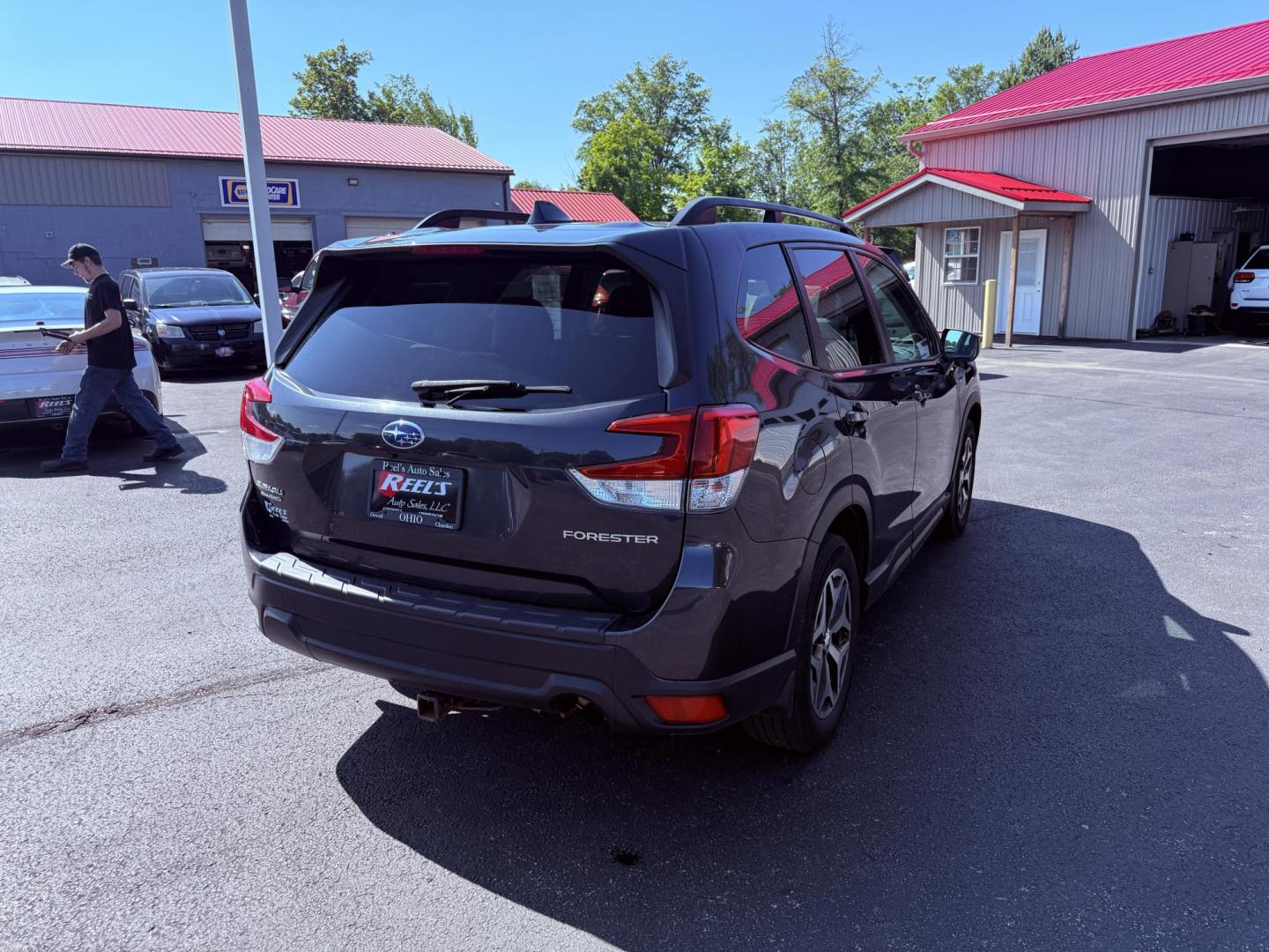 2019 Gray /Black Subaru Forester Premium (JF2SKAEC0KH) with an 2.5L H4 DOHC 16V engine, Automatic transmission, located at 547 E. Main St., Orwell, OH, 44076, (440) 437-5893, 41.535435, -80.847855 - Photo#7