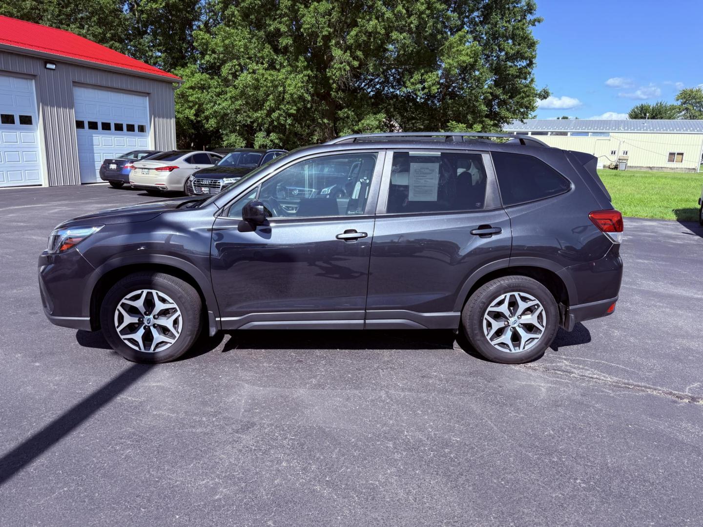 2019 Gray /Black Subaru Forester Premium (JF2SKAEC0KH) with an 2.5L H4 DOHC 16V engine, Automatic transmission, located at 547 E. Main St., Orwell, OH, 44076, (440) 437-5893, 41.535435, -80.847855 - Photo#12