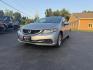 2015 Silver /Gray Honda Civic LX Sedan CVT (19XFB2F51FE) with an 1.8L I4 SOHC 16V engine, Automatic transmission, located at 11115 Chardon Rd. , Chardon, OH, 44024, (440) 214-9705, 41.580246, -81.241943 - This 2015 Honda Civic LX Sedan features a 1.8-liter inline-4 engine with Honda's ECO Assist technology, delivering up to 37 MPG on the highway for efficient commuting. Standard features include daytime running lights, a backup camera for added safety, and a USB audio input for convenient connectivit - Photo#0