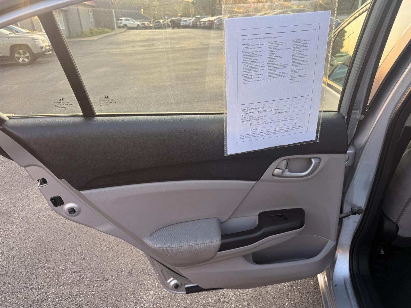 2015 Silver /Gray Honda Civic LX Sedan CVT (19XFB2F51FE) with an 1.8L I4 SOHC 16V engine, Automatic transmission, located at 11115 Chardon Rd. , Chardon, OH, 44024, (440) 214-9705, 41.580246, -81.241943 - This 2015 Honda Civic LX Sedan features a 1.8-liter inline-4 engine with Honda's ECO Assist technology, delivering up to 37 MPG on the highway for efficient commuting. Standard features include daytime running lights, a backup camera for added safety, and a USB audio input for convenient connectivit - Photo#25