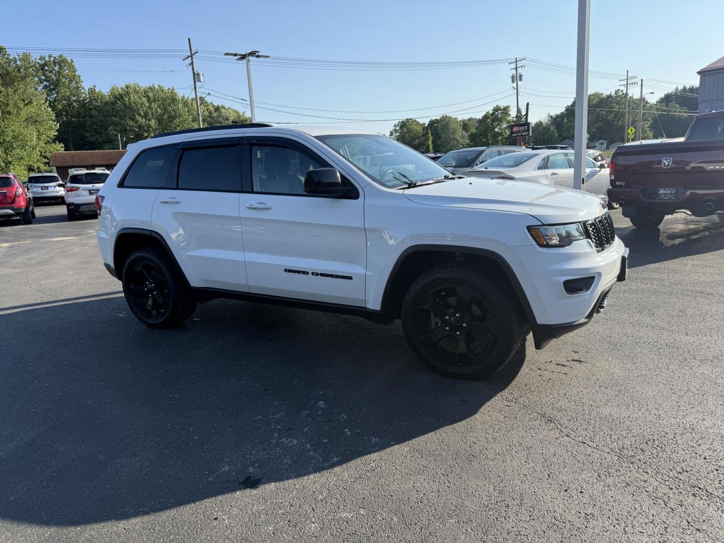 2019 White /Black Jeep Grand Cherokee Upland 4WD (1C4RJFAG7KC) with an 3.6L V6 DOHC 24V engine, 8A transmission, located at 547 E. Main St., Orwell, OH, 44076, (440) 437-5893, 41.535435, -80.847855 - This One Owner 2019 Jeep Grand Cherokee Upland 4WD features a 3.6L Pentastar V6 engine paired with an 8-speed automatic transmission, offering a blend of power and efficiency. It comes equipped with convenience and comfort features such as a power driver's seat, heated front seats, remote start, and - Photo#3