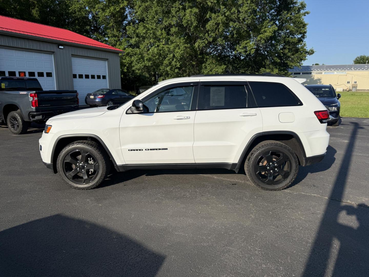 2019 White /Black Jeep Grand Cherokee Upland 4WD (1C4RJFAG7KC) with an 3.6L V6 DOHC 24V engine, 8A transmission, located at 547 E. Main St., Orwell, OH, 44076, (440) 437-5893, 41.535435, -80.847855 - This One Owner 2019 Jeep Grand Cherokee Upland 4WD features a 3.6L Pentastar V6 engine paired with an 8-speed automatic transmission, offering a blend of power and efficiency. It comes equipped with convenience and comfort features such as a power driver's seat, heated front seats, remote start, and - Photo#12