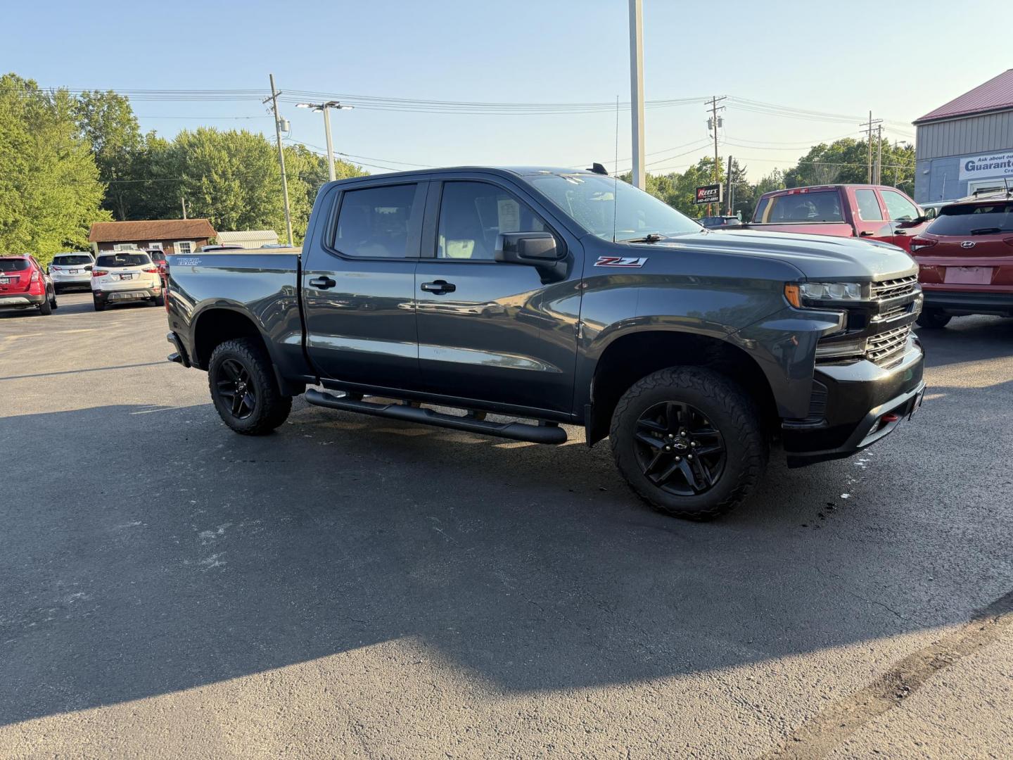 2019 Gray /Black Chevrolet Silverado 1500 LT Trail Boss Crew Cab Short Box 4WD (1GCPYFED6KZ) with an 5.3L V8 OHV 16V engine, 8-Speed Automatic transmission, located at 547 E. Main St., Orwell, OH, 44076, (440) 437-5893, 41.535435, -80.847855 - Photo#2