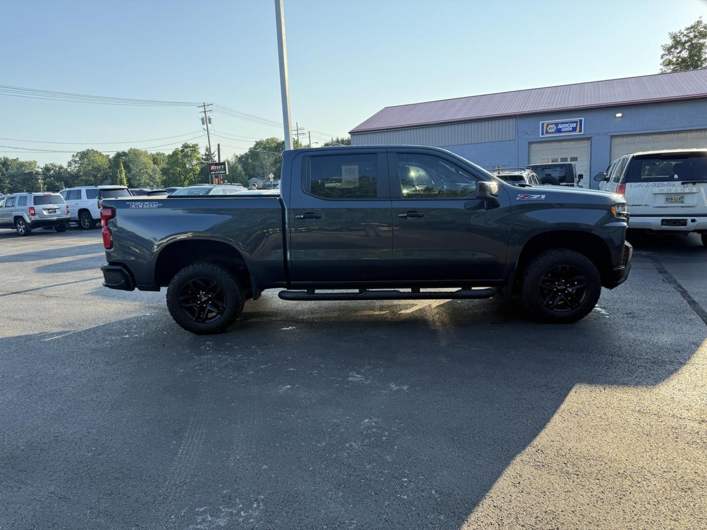 2019 Gray /Black Chevrolet Silverado 1500 LT Trail Boss Crew Cab Short Box 4WD (1GCPYFED6KZ) with an 5.3L V8 OHV 16V engine, 8-Speed Automatic transmission, located at 547 E. Main St., Orwell, OH, 44076, (440) 437-5893, 41.535435, -80.847855 - Photo#5