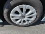 2019 Green /White Toyota Prius LE (JTDKARFU6K3) with an 1.8L I4 DOHC 16V HYBRID engine, Automatic transmission, located at 11115 Chardon Rd. , Chardon, OH, 44024, (440) 214-9705, 41.580246, -81.241943 - This One Owner 2019 Toyota Prius LE offers an impressive 50 MPG combined fuel efficiency and comes well-equipped with features such as full exterior LED lighting, adaptive cruise control, lane keep assist, front and rear parking sensors, forward collision warning, and blind spot monitoring for enhan - Photo#4