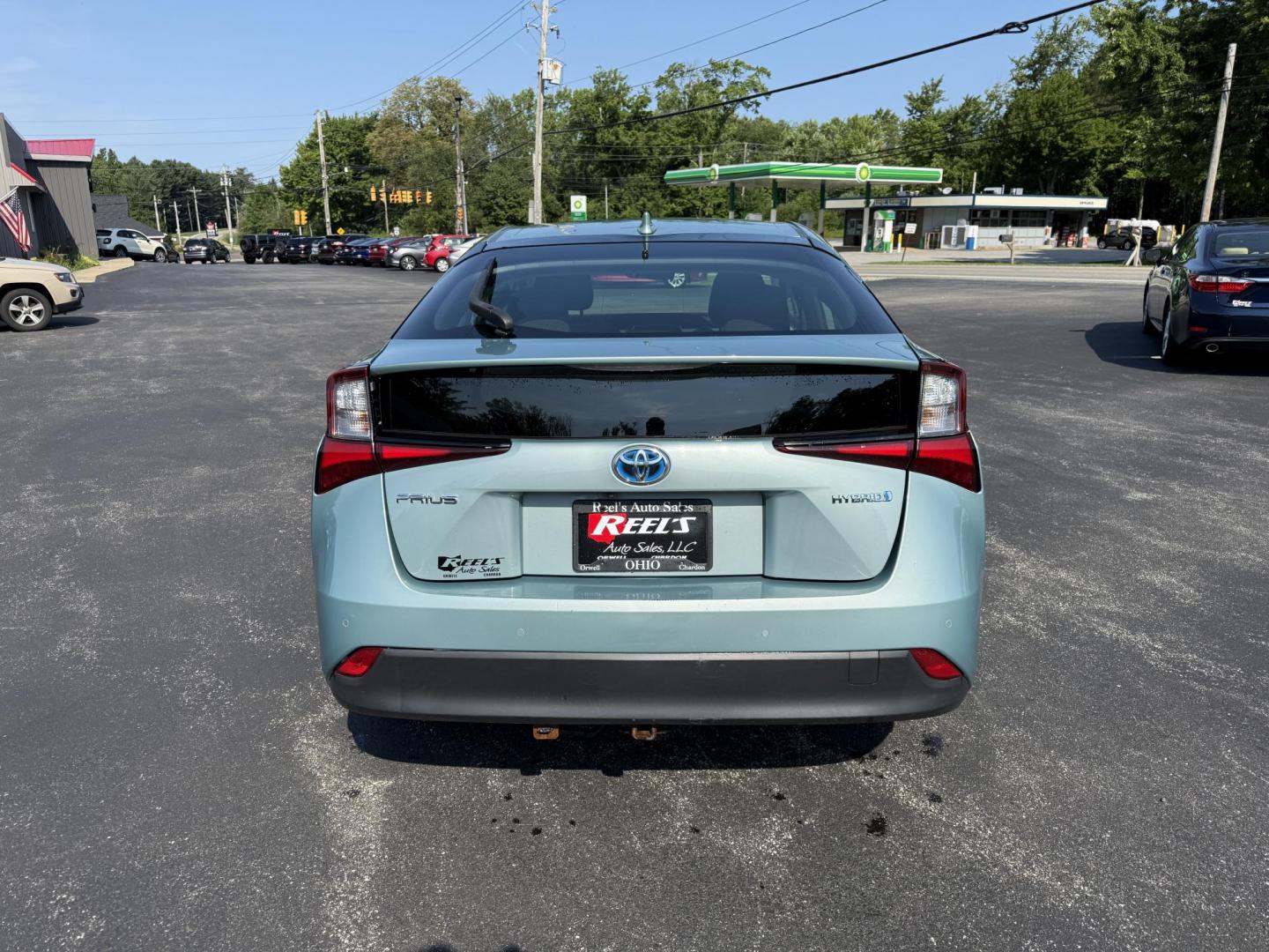 2019 Green /White Toyota Prius LE (JTDKARFU6K3) with an 1.8L I4 DOHC 16V HYBRID engine, Automatic transmission, located at 11115 Chardon Rd. , Chardon, OH, 44024, (440) 214-9705, 41.580246, -81.241943 - This One Owner 2019 Toyota Prius LE offers an impressive 50 MPG combined fuel efficiency and comes well-equipped with features such as full exterior LED lighting, adaptive cruise control, lane keep assist, front and rear parking sensors, forward collision warning, and blind spot monitoring for enhan - Photo#8