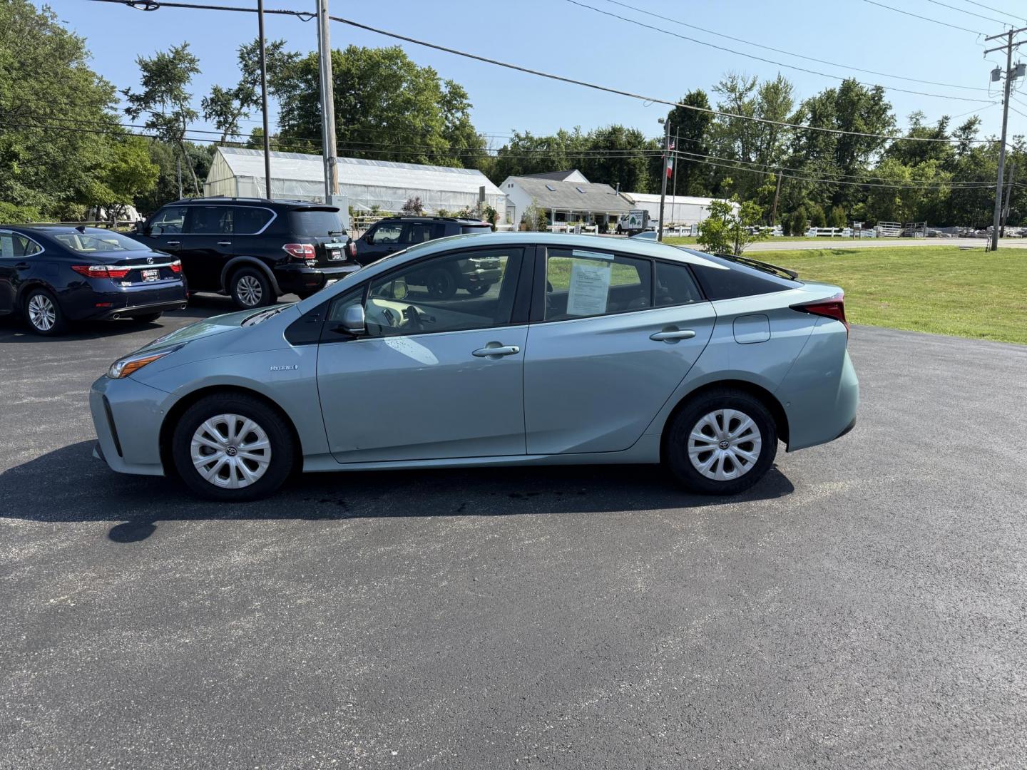 2019 Green /White Toyota Prius LE (JTDKARFU6K3) with an 1.8L I4 DOHC 16V HYBRID engine, Automatic transmission, located at 11115 Chardon Rd. , Chardon, OH, 44024, (440) 214-9705, 41.580246, -81.241943 - This One Owner 2019 Toyota Prius LE offers an impressive 50 MPG combined fuel efficiency and comes well-equipped with features such as full exterior LED lighting, adaptive cruise control, lane keep assist, front and rear parking sensors, forward collision warning, and blind spot monitoring for enhan - Photo#12