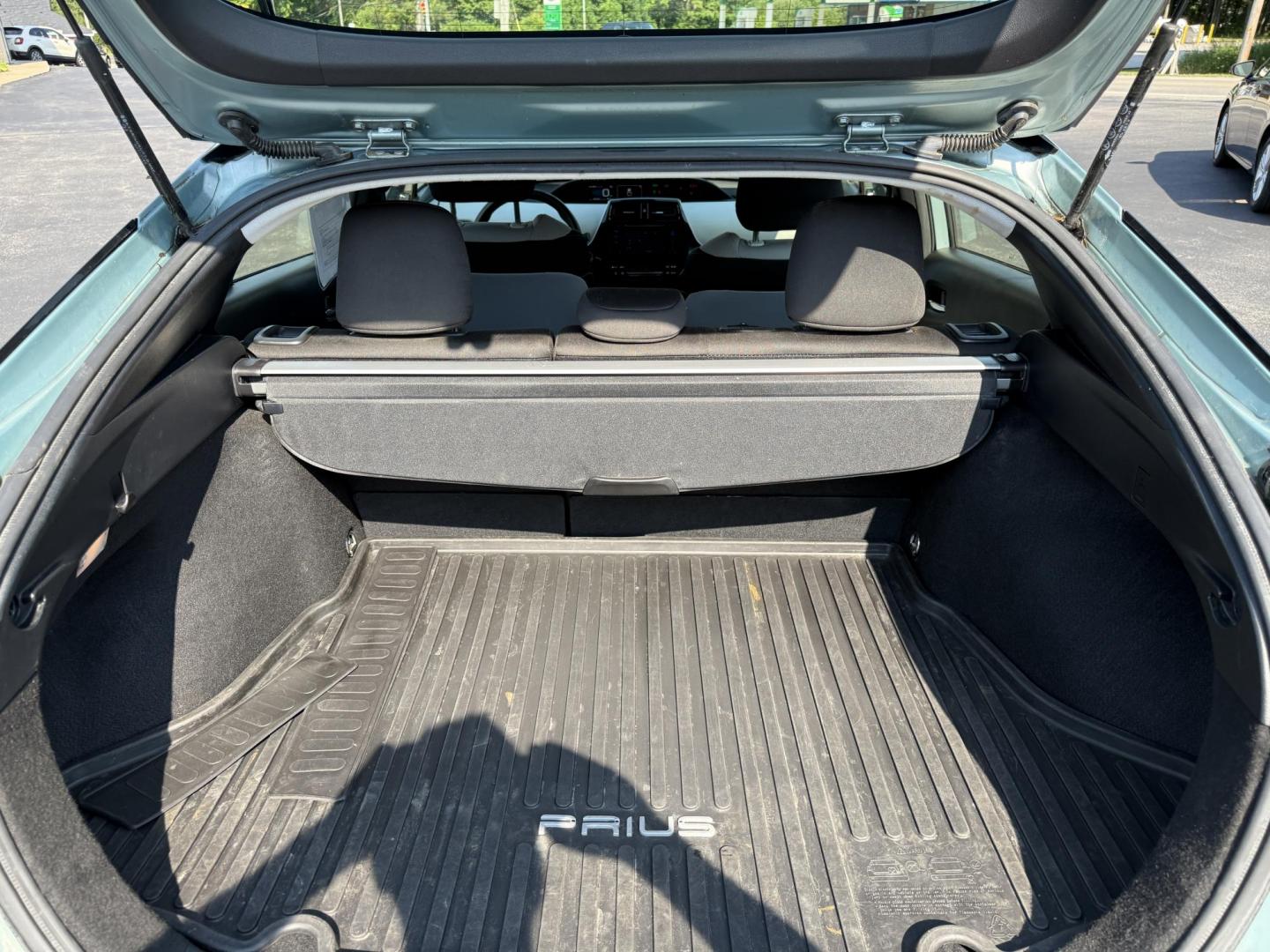 2019 Green /White Toyota Prius LE (JTDKARFU6K3) with an 1.8L I4 DOHC 16V HYBRID engine, Automatic transmission, located at 11115 Chardon Rd. , Chardon, OH, 44024, (440) 214-9705, 41.580246, -81.241943 - This One Owner 2019 Toyota Prius LE offers an impressive 50 MPG combined fuel efficiency and comes well-equipped with features such as full exterior LED lighting, adaptive cruise control, lane keep assist, front and rear parking sensors, forward collision warning, and blind spot monitoring for enhan - Photo#31