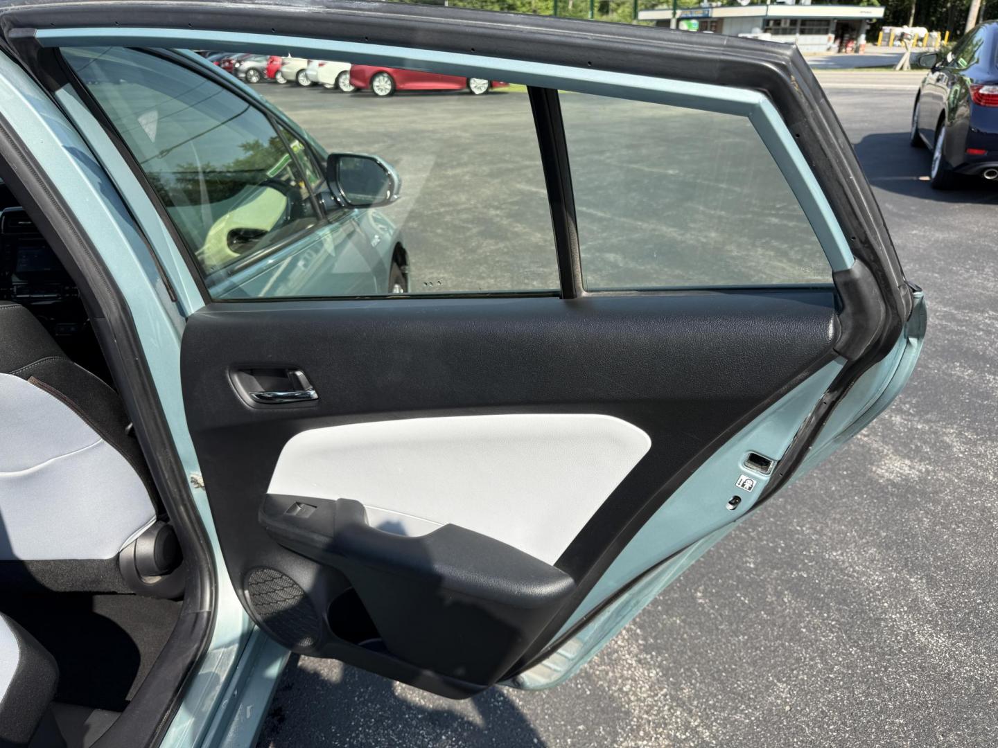 2019 Green /White Toyota Prius LE (JTDKARFU6K3) with an 1.8L I4 DOHC 16V HYBRID engine, Automatic transmission, located at 11115 Chardon Rd. , Chardon, OH, 44024, (440) 214-9705, 41.580246, -81.241943 - This One Owner 2019 Toyota Prius LE offers an impressive 50 MPG combined fuel efficiency and comes well-equipped with features such as full exterior LED lighting, adaptive cruise control, lane keep assist, front and rear parking sensors, forward collision warning, and blind spot monitoring for enhan - Photo#34