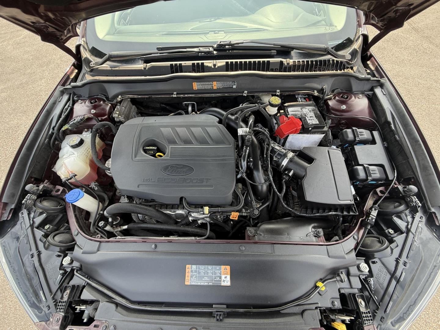 2018 Burgundy /Black Ford Fusion SE (3FA6P0HD7JR) with an 1.5L I4 DOHC 16V Turbo engine, 6A transmission, located at 11115 Chardon Rd. , Chardon, OH, 44024, (440) 214-9705, 41.580246, -81.241943 - This One Owner 2018 Ford Fusion SE FWD is powered by a 1.5L turbocharged EcoBoost I4 engine paired with a 6-speed automatic transmission, delivering up to 34 MPG on the highway. It features an 8.0-inch center touchscreen with Apple CarPlay and Android Auto, dual zone automatic climate control, power - Photo#14