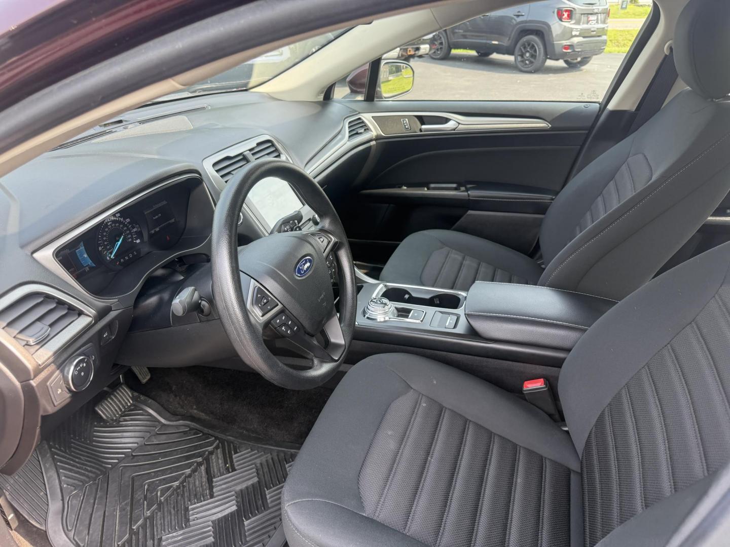 2018 Burgundy /Black Ford Fusion SE (3FA6P0HD7JR) with an 1.5L I4 DOHC 16V Turbo engine, 6A transmission, located at 11115 Chardon Rd. , Chardon, OH, 44024, (440) 214-9705, 41.580246, -81.241943 - This One Owner 2018 Ford Fusion SE FWD is powered by a 1.5L turbocharged EcoBoost I4 engine paired with a 6-speed automatic transmission, delivering up to 34 MPG on the highway. It features an 8.0-inch center touchscreen with Apple CarPlay and Android Auto, dual zone automatic climate control, power - Photo#15
