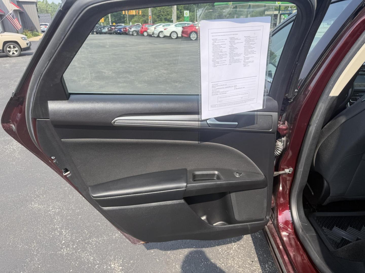 2018 Burgundy /Black Ford Fusion SE (3FA6P0HD7JR) with an 1.5L I4 DOHC 16V Turbo engine, 6A transmission, located at 11115 Chardon Rd. , Chardon, OH, 44024, (440) 214-9705, 41.580246, -81.241943 - This One Owner 2018 Ford Fusion SE FWD is powered by a 1.5L turbocharged EcoBoost I4 engine paired with a 6-speed automatic transmission, delivering up to 34 MPG on the highway. It features an 8.0-inch center touchscreen with Apple CarPlay and Android Auto, dual zone automatic climate control, power - Photo#33