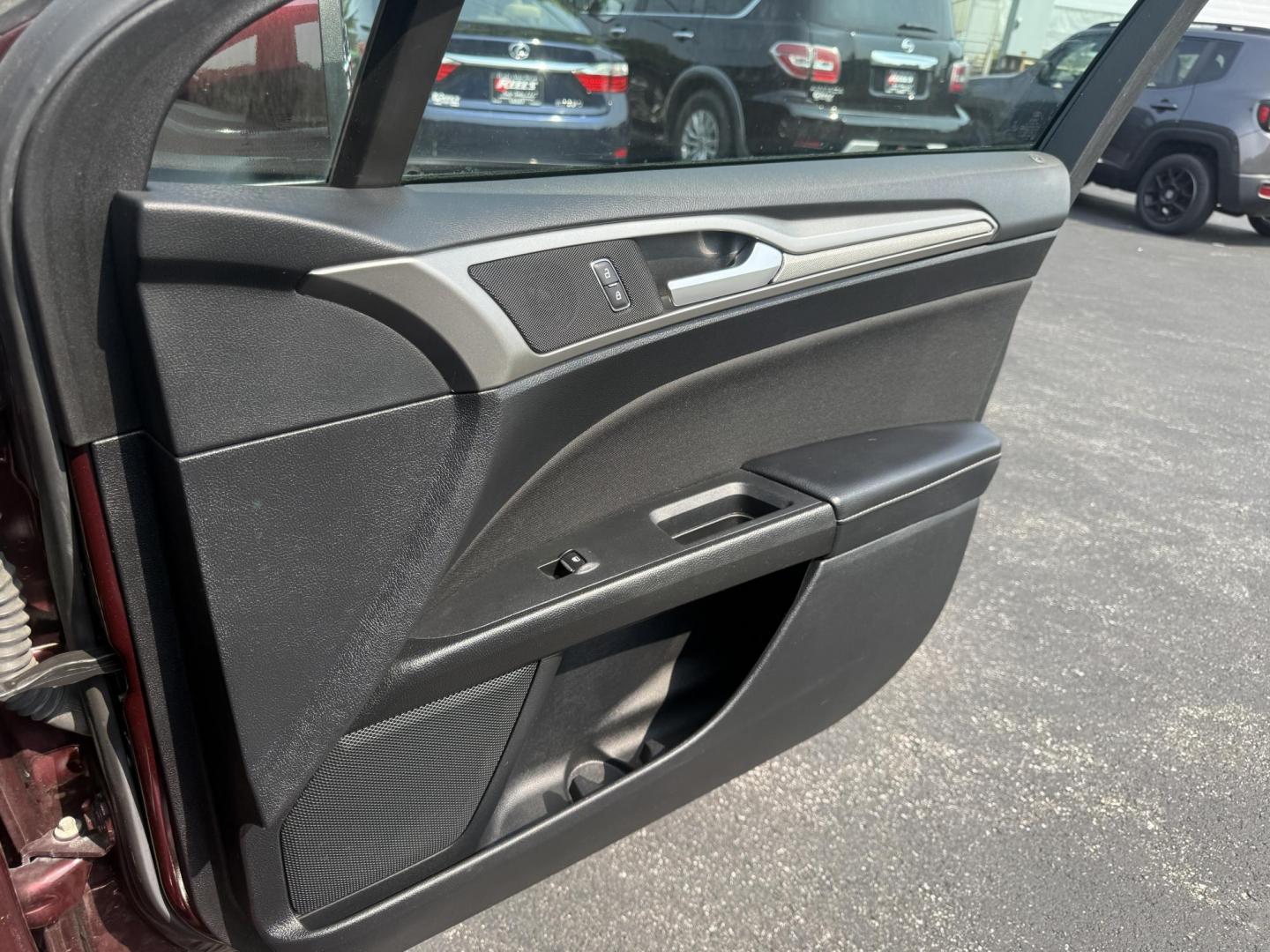 2018 Burgundy /Black Ford Fusion SE (3FA6P0HD7JR) with an 1.5L I4 DOHC 16V Turbo engine, 6A transmission, located at 11115 Chardon Rd. , Chardon, OH, 44024, (440) 214-9705, 41.580246, -81.241943 - This One Owner 2018 Ford Fusion SE FWD is powered by a 1.5L turbocharged EcoBoost I4 engine paired with a 6-speed automatic transmission, delivering up to 34 MPG on the highway. It features an 8.0-inch center touchscreen with Apple CarPlay and Android Auto, dual zone automatic climate control, power - Photo#45