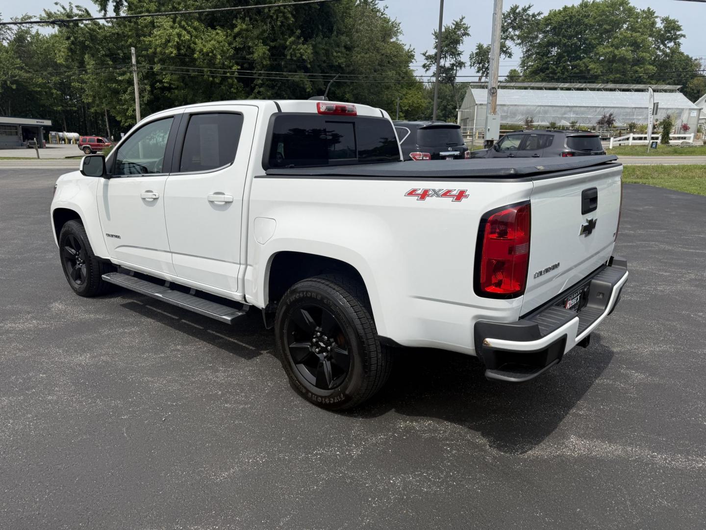 2016 White /Black Chevrolet Colorado LT Crew Cab 4WD Short Box (1GCGTCE36G1) with an 3.6L V6 DOHC 24V GAS engine, 6A transmission, located at 11115 Chardon Rd. , Chardon, OH, 44024, (440) 214-9705, 41.580246, -81.241943 - Photo#11