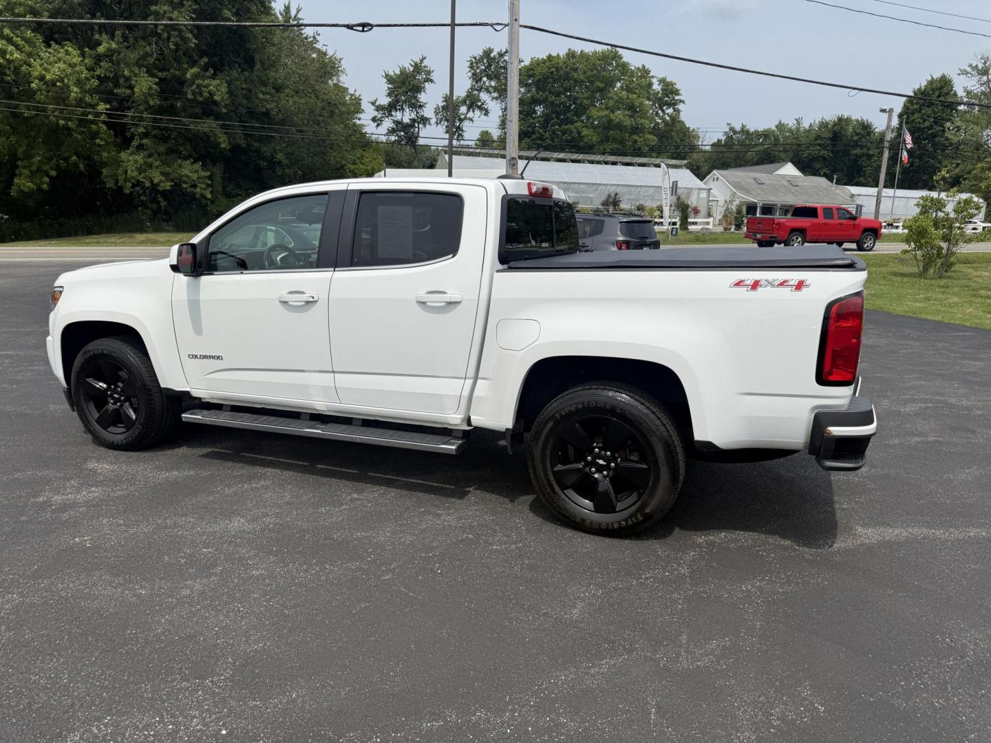 2016 White /Black Chevrolet Colorado LT Crew Cab 4WD Short Box (1GCGTCE36G1) with an 3.6L V6 DOHC 24V GAS engine, 6A transmission, located at 11115 Chardon Rd. , Chardon, OH, 44024, (440) 214-9705, 41.580246, -81.241943 - Photo#12