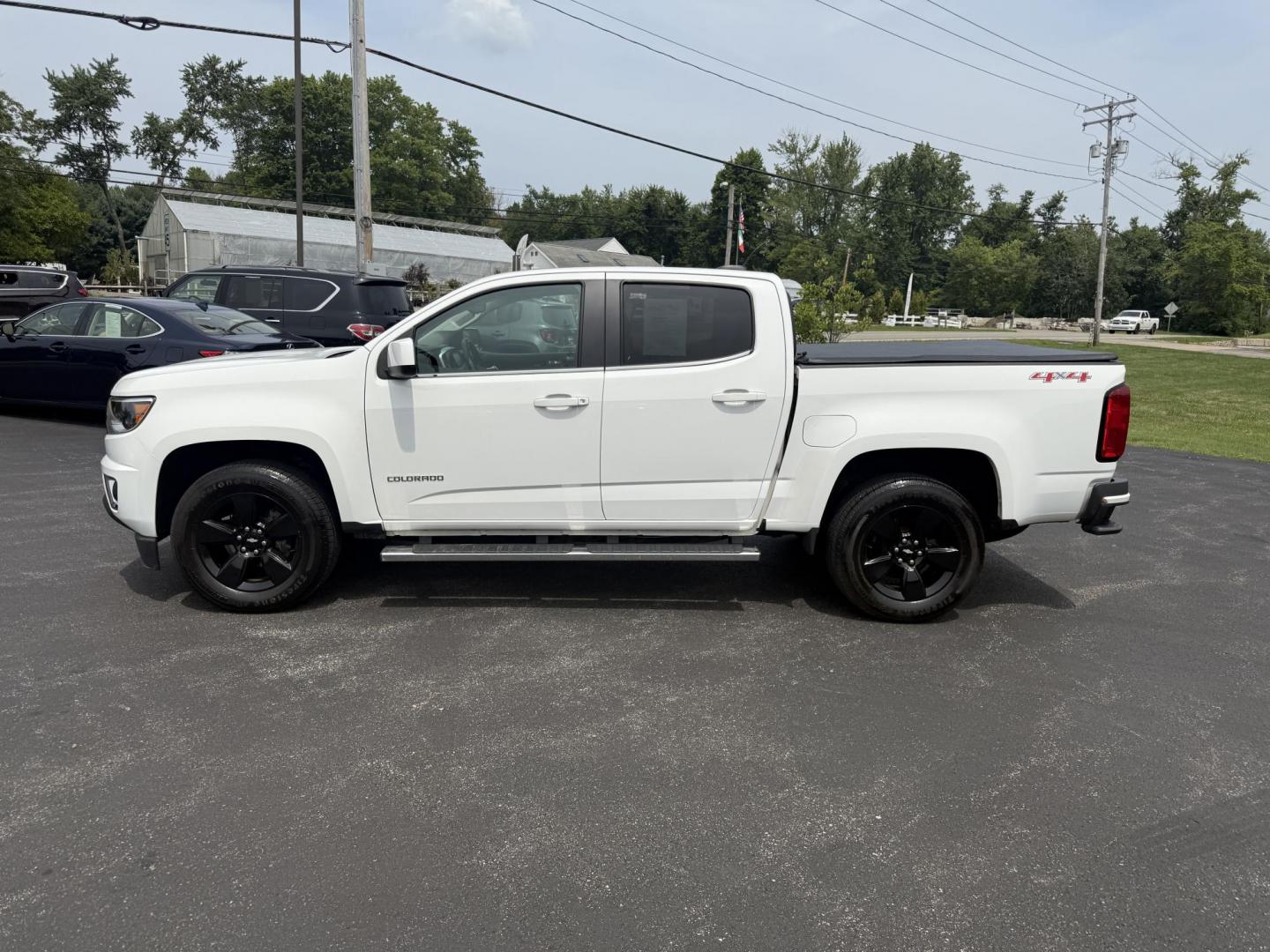 2016 White /Black Chevrolet Colorado LT Crew Cab 4WD Short Box (1GCGTCE36G1) with an 3.6L V6 DOHC 24V GAS engine, 6A transmission, located at 11115 Chardon Rd. , Chardon, OH, 44024, (440) 214-9705, 41.580246, -81.241943 - Photo#14