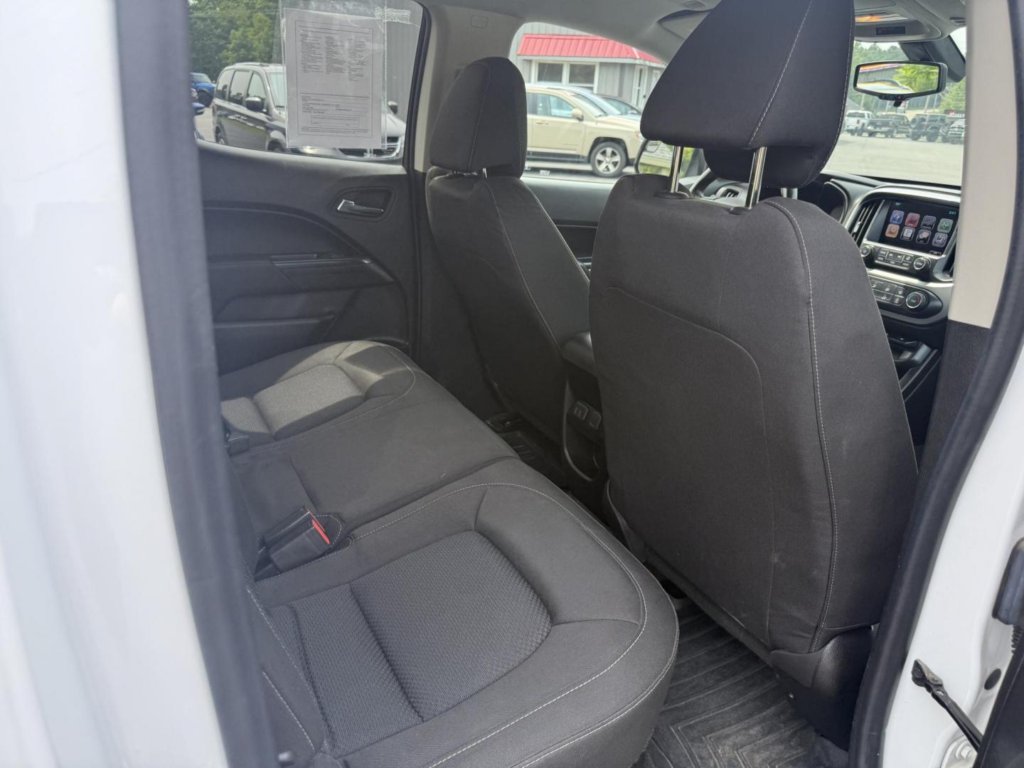 2016 White /Black Chevrolet Colorado LT Crew Cab 4WD Short Box (1GCGTCE36G1) with an 3.6L V6 DOHC 24V GAS engine, 6A transmission, located at 11115 Chardon Rd. , Chardon, OH, 44024, (440) 214-9705, 41.580246, -81.241943 - Photo#36