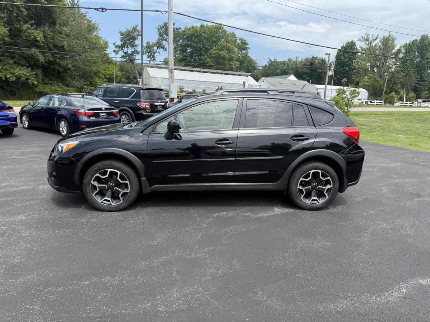2014 Black /Tan Subaru XV Crosstrek 2.0 Limited (JF2GPAKC9E8) with an 2.0L I4 DOHC 16V engine, Automatic transmission, located at 11115 Chardon Rd. , Chardon, OH, 44024, (440) 214-9705, 41.580246, -81.241943 - This One Owner 2014 Subaru XV Crosstrek 2.0 Limited features a 2.0L H4 engine paired with Subaru’s Symmetrical All-Wheel Drive system, delivering secure handling and up to 32 MPG on the highway. It comes well-appointed with a leather interior, heated front seats, single zone automatic climate cont - Photo#12