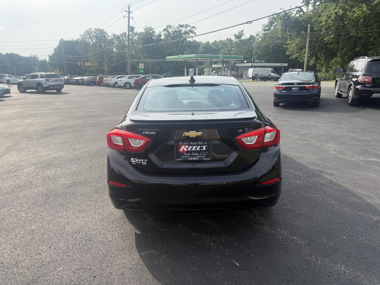 2016 Black /Black Chevrolet Cruze LT Auto (1G1BE5SM1G7) with an 1.4L I4 DOHC 16V TURBO engine, 6A transmission, located at 11115 Chardon Rd. , Chardon, OH, 44024, (440) 214-9705, 41.580246, -81.241943 - This 2016 Chevrolet Cruze LT RS features a 1.4L turbocharged EcoTec I4 engine with a 6-speed automatic transmission, achieving up to 40 MPG on the highway. This well-equipped sedan includes a power driver’s seat, push button start, heated front seats, remote start, the sporty RS package, a 7.0-inc - Photo#8