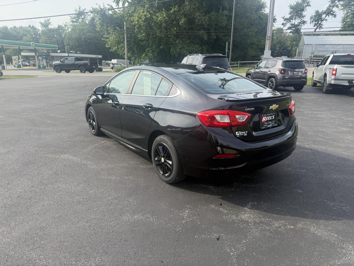 2016 Black /Black Chevrolet Cruze LT Auto (1G1BE5SM1G7) with an 1.4L I4 DOHC 16V TURBO engine, 6A transmission, located at 11115 Chardon Rd. , Chardon, OH, 44024, (440) 214-9705, 41.580246, -81.241943 - This 2016 Chevrolet Cruze LT RS features a 1.4L turbocharged EcoTec I4 engine with a 6-speed automatic transmission, achieving up to 40 MPG on the highway. This well-equipped sedan includes a power driver’s seat, push button start, heated front seats, remote start, the sporty RS package, a 7.0-inc - Photo#9