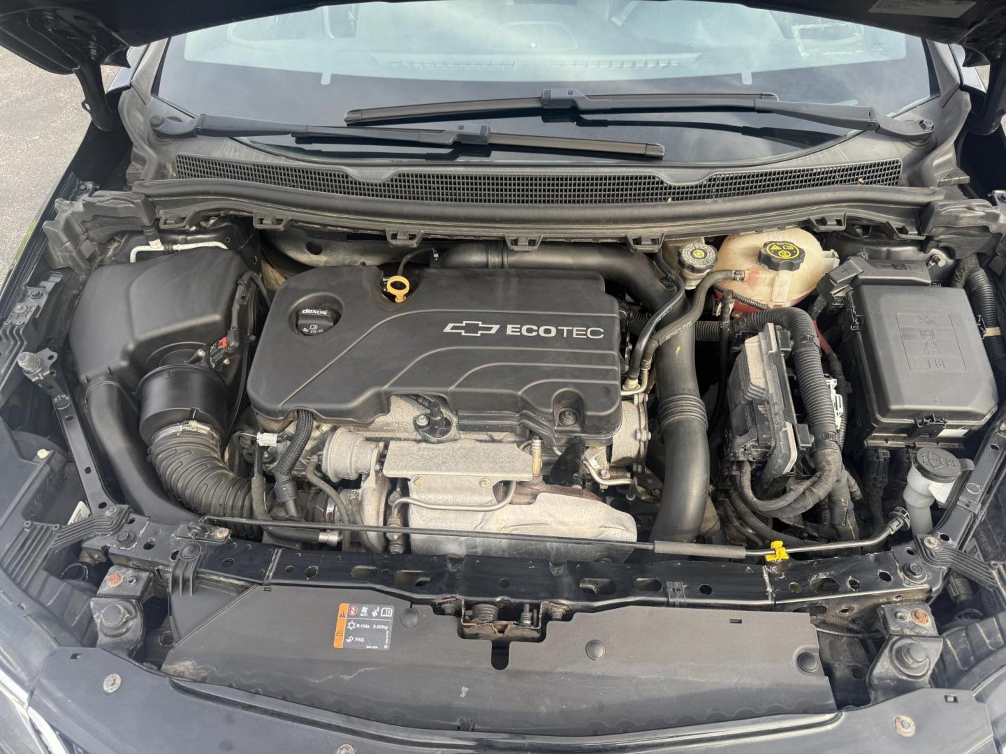 2016 Black /Black Chevrolet Cruze LT Auto (1G1BE5SM1G7) with an 1.4L I4 DOHC 16V TURBO engine, 6A transmission, located at 11115 Chardon Rd. , Chardon, OH, 44024, (440) 214-9705, 41.580246, -81.241943 - This 2016 Chevrolet Cruze LT RS features a 1.4L turbocharged EcoTec I4 engine with a 6-speed automatic transmission, achieving up to 40 MPG on the highway. This well-equipped sedan includes a power driver’s seat, push button start, heated front seats, remote start, the sporty RS package, a 7.0-inc - Photo#14