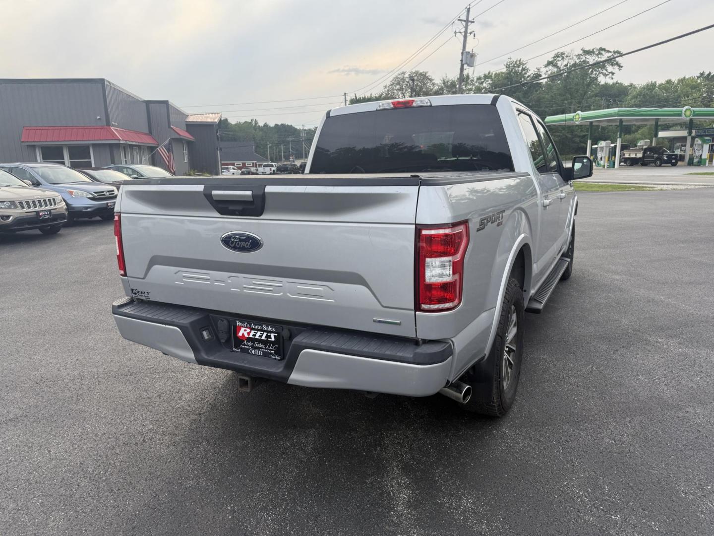 2018 Silver /Black Ford F-150 XLT SuperCrew 5.5-ft. Bed 4WD (1FTEW1EP0JK) with an 2.7L V6 DOHC 24V TWIN TURBO engine, 10 Speed Auto transmission, located at 547 E. Main St., Orwell, OH, 44076, (440) 437-5893, 41.535435, -80.847855 - This One Owner 2018 Ford F-150 is from Florida and it really shows underneath. Powered by Ford's incredible 2.7 Twin Turbo EcoBoost V6 engine and a 10 speed automatic transmission this truck will tow up to 7,600 pounds while achieving a respectable fuel economy of 24 MPG highway. On the inside you g - Photo#7