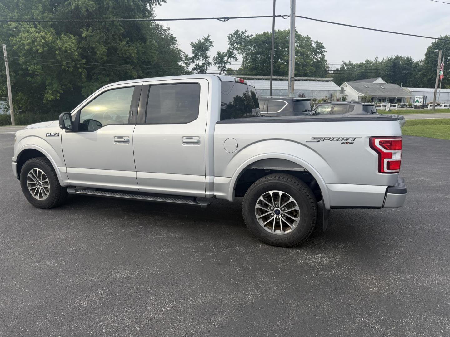 2018 Silver /Black Ford F-150 XLT SuperCrew 5.5-ft. Bed 4WD (1FTEW1EP0JK) with an 2.7L V6 DOHC 24V TWIN TURBO engine, 10 Speed Auto transmission, located at 547 E. Main St., Orwell, OH, 44076, (440) 437-5893, 41.535435, -80.847855 - This One Owner 2018 Ford F-150 is from Florida and it really shows underneath. Powered by Ford's incredible 2.7 Twin Turbo EcoBoost V6 engine and a 10 speed automatic transmission this truck will tow up to 7,600 pounds while achieving a respectable fuel economy of 24 MPG highway. On the inside you g - Photo#12