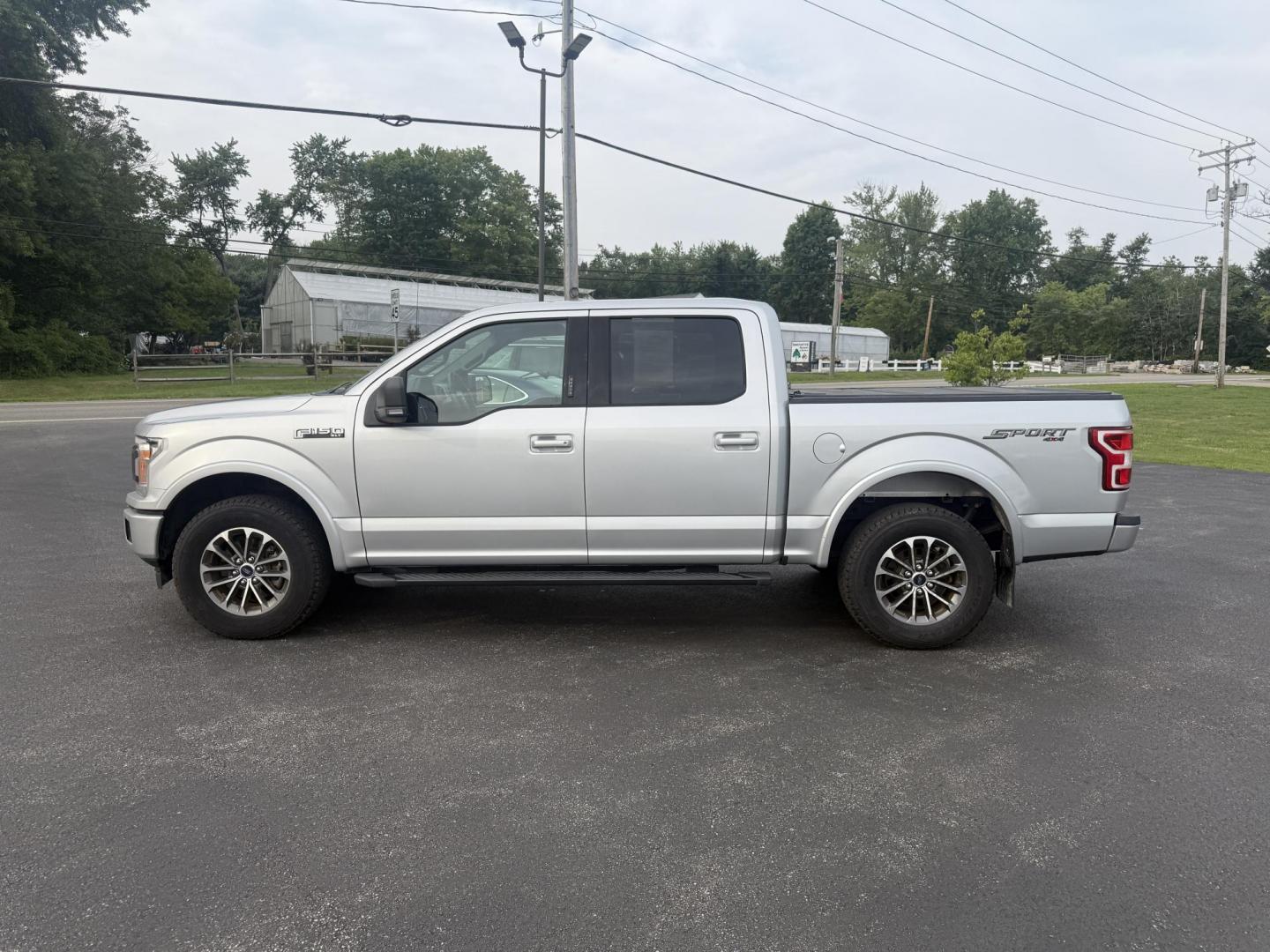 2018 Silver /Black Ford F-150 XLT SuperCrew 5.5-ft. Bed 4WD (1FTEW1EP0JK) with an 2.7L V6 DOHC 24V TWIN TURBO engine, 10 Speed Auto transmission, located at 547 E. Main St., Orwell, OH, 44076, (440) 437-5893, 41.535435, -80.847855 - This One Owner 2018 Ford F-150 is from Florida and it really shows underneath. Powered by Ford's incredible 2.7 Twin Turbo EcoBoost V6 engine and a 10 speed automatic transmission this truck will tow up to 7,600 pounds while achieving a respectable fuel economy of 24 MPG highway. On the inside you g - Photo#14