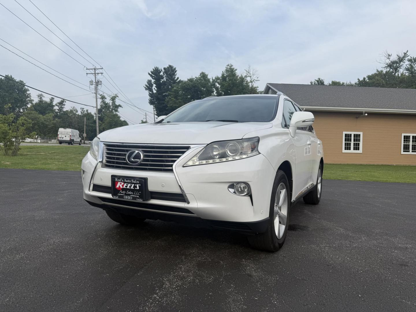 2015 White /Black Lexus RX 350 AWD (2T2BK1BA7FC) with an 3.5L V6 DOHC 24V engine, 6-Speed Automatic transmission, located at 11115 Chardon Rd. , Chardon, OH, 44024, (440) 214-9705, 41.580246, -81.241943 - This Lexus is a luxury SUV with Toyota reliability. Powered by Toyota's 3.5 V6 engine and a 6 speed automatic transmission this SUV offers butter smooth power delivery while not hurting at the pump. On the inside you'll find a leather wrapped interior with powered heated and cooled front seats, a pr - Photo#0