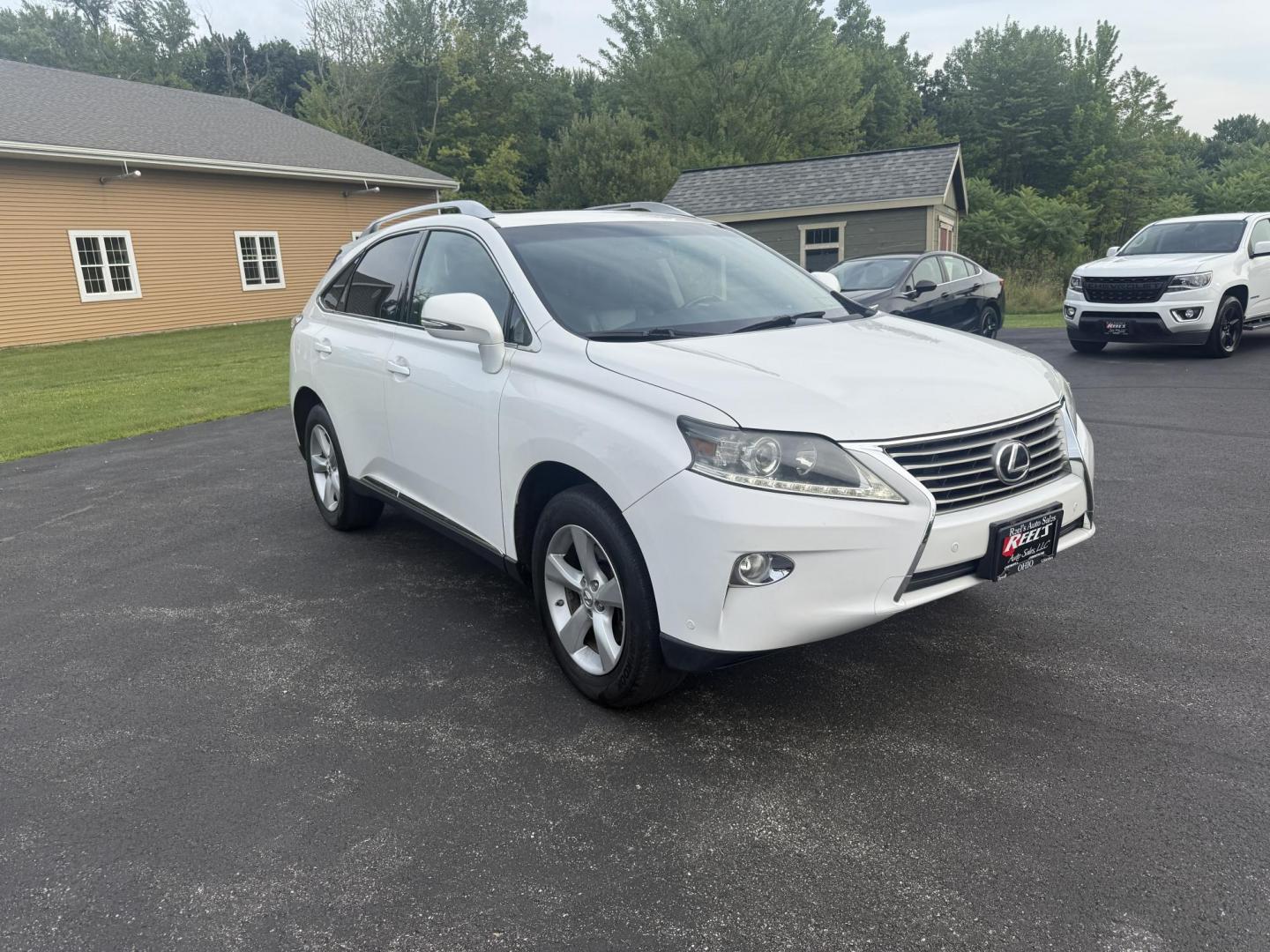 2015 White /Black Lexus RX 350 AWD (2T2BK1BA7FC) with an 3.5L V6 DOHC 24V engine, 6-Speed Automatic transmission, located at 11115 Chardon Rd. , Chardon, OH, 44024, (440) 214-9705, 41.580246, -81.241943 - This Lexus is a luxury SUV with Toyota reliability. Powered by Toyota's 3.5 V6 engine and a 6 speed automatic transmission this SUV offers butter smooth power delivery while not hurting at the pump. On the inside you'll find a leather wrapped interior with powered heated and cooled front seats, a pr - Photo#2