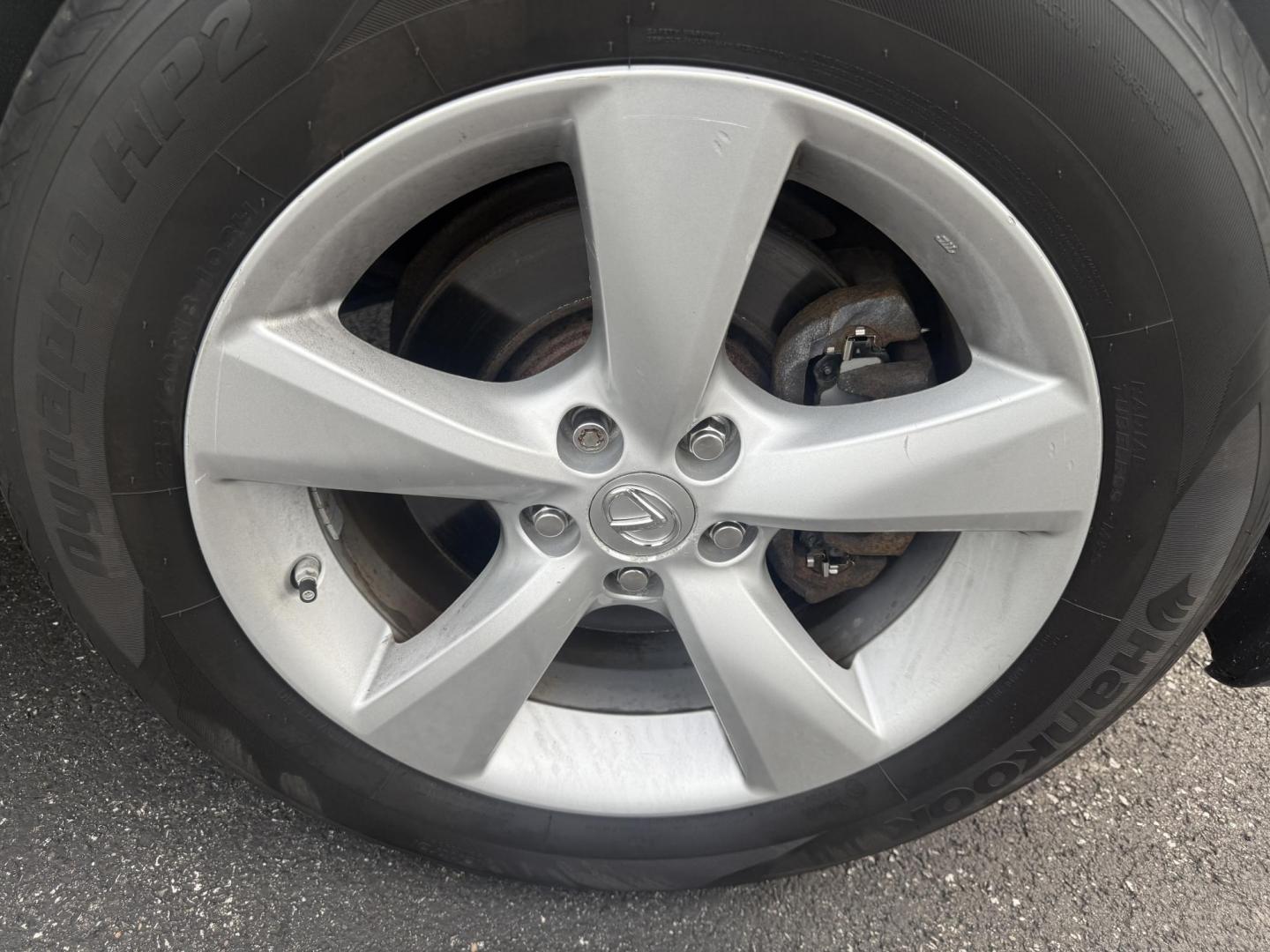 2015 White /Black Lexus RX 350 AWD (2T2BK1BA7FC) with an 3.5L V6 DOHC 24V engine, 6-Speed Automatic transmission, located at 11115 Chardon Rd. , Chardon, OH, 44024, (440) 214-9705, 41.580246, -81.241943 - This Lexus is a luxury SUV with Toyota reliability. Powered by Toyota's 3.5 V6 engine and a 6 speed automatic transmission this SUV offers butter smooth power delivery while not hurting at the pump. On the inside you'll find a leather wrapped interior with powered heated and cooled front seats, a pr - Photo#4
