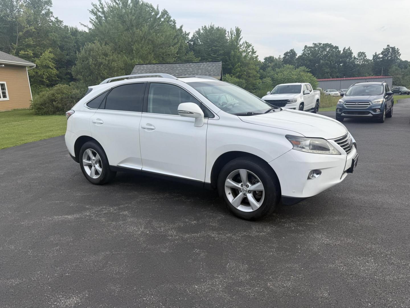 2015 White /Black Lexus RX 350 AWD (2T2BK1BA7FC) with an 3.5L V6 DOHC 24V engine, 6-Speed Automatic transmission, located at 11115 Chardon Rd. , Chardon, OH, 44024, (440) 214-9705, 41.580246, -81.241943 - This Lexus is a luxury SUV with Toyota reliability. Powered by Toyota's 3.5 V6 engine and a 6 speed automatic transmission this SUV offers butter smooth power delivery while not hurting at the pump. On the inside you'll find a leather wrapped interior with powered heated and cooled front seats, a pr - Photo#3