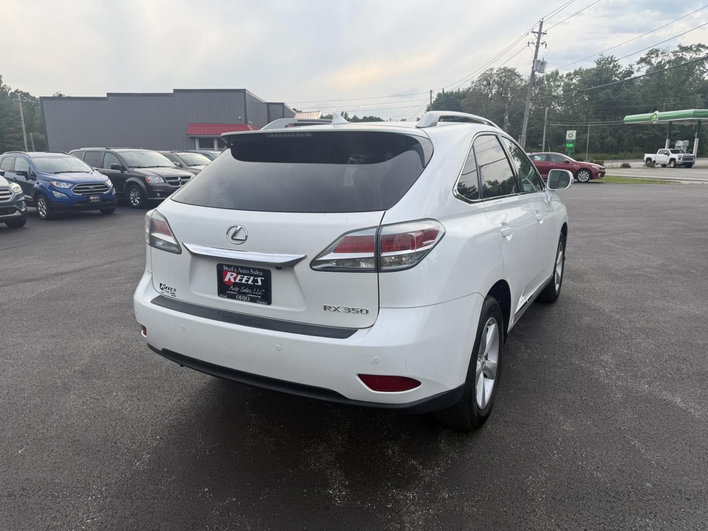 2015 White /Black Lexus RX 350 AWD (2T2BK1BA7FC) with an 3.5L V6 DOHC 24V engine, 6-Speed Automatic transmission, located at 11115 Chardon Rd. , Chardon, OH, 44024, (440) 214-9705, 41.580246, -81.241943 - This Lexus is a luxury SUV with Toyota reliability. Powered by Toyota's 3.5 V6 engine and a 6 speed automatic transmission this SUV offers butter smooth power delivery while not hurting at the pump. On the inside you'll find a leather wrapped interior with powered heated and cooled front seats, a pr - Photo#7