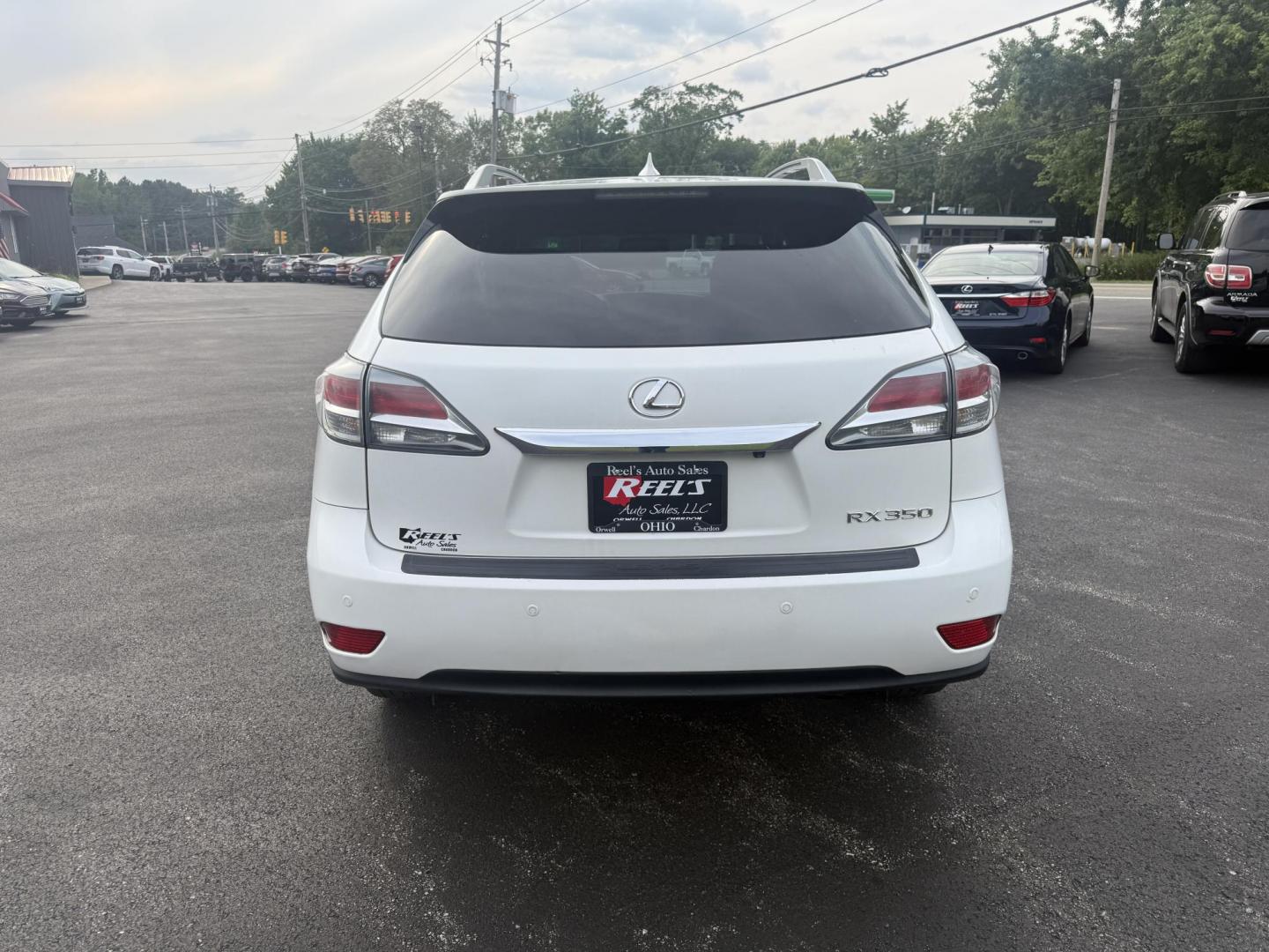 2015 White /Black Lexus RX 350 AWD (2T2BK1BA7FC) with an 3.5L V6 DOHC 24V engine, 6-Speed Automatic transmission, located at 11115 Chardon Rd. , Chardon, OH, 44024, (440) 214-9705, 41.580246, -81.241943 - This Lexus is a luxury SUV with Toyota reliability. Powered by Toyota's 3.5 V6 engine and a 6 speed automatic transmission this SUV offers butter smooth power delivery while not hurting at the pump. On the inside you'll find a leather wrapped interior with powered heated and cooled front seats, a pr - Photo#8