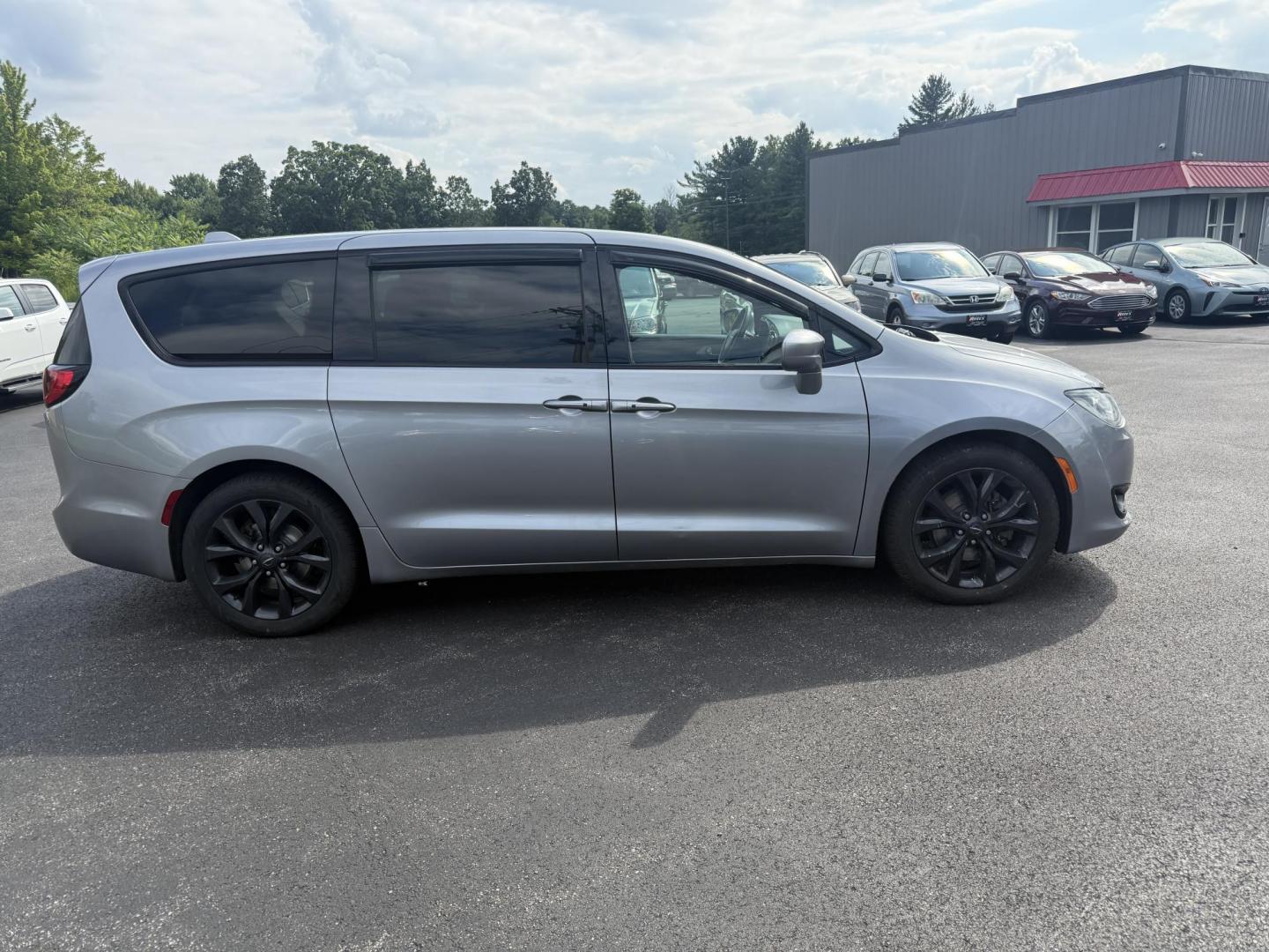 2019 Silver /Black Chrysler Pacifica Touring Plus (2C4RC1FG2KR) with an 3.6L V6 DOHC 24V engine, 9A transmission, located at 547 E. Main St., Orwell, OH, 44076, (440) 437-5893, 41.535435, -80.847855 - This 2019 Chrysler Pacifica Touring Plus with the 3.6 Pentastar V6 engine and 9-speed automatic transmission offers a versatile and comfortable family vehicle, achieving around 28 MPG highway. It features a power driver’s seat, a 7.0-inch touchscreen with Apple CarPlay and Android Auto, tri-zone a - Photo#5
