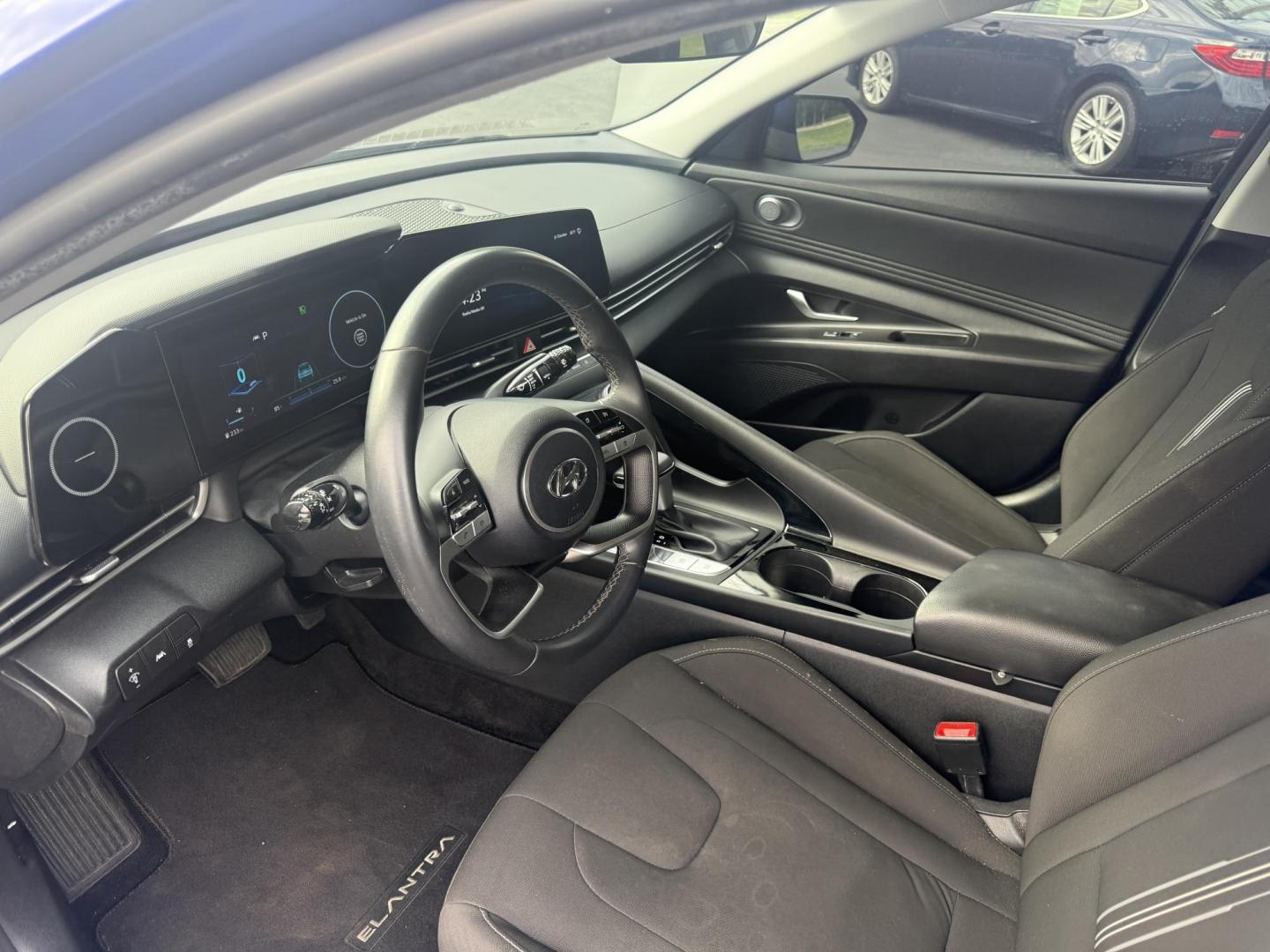2023 Blue /Black Hyundai Elantra SEL (KMHLS4AGXPU) with an 2.0L I4 DOHC 16V engine, Automatic transmission, located at 11115 Chardon Rd. , Chardon, OH, 44024, (440) 214-9705, 41.580246, -81.241943 - This One Owner 2023 Hyundai Elantra SEL with a 2.0L I4 GDI engine delivers impressive fuel efficiency, achieving around 40 MPG highway, and boasts modern features such as LED daytime running lights, a large 10.25-inch touchscreen with Apple CarPlay and Android Auto, heated front seats, a 10.25-inch - Photo#14