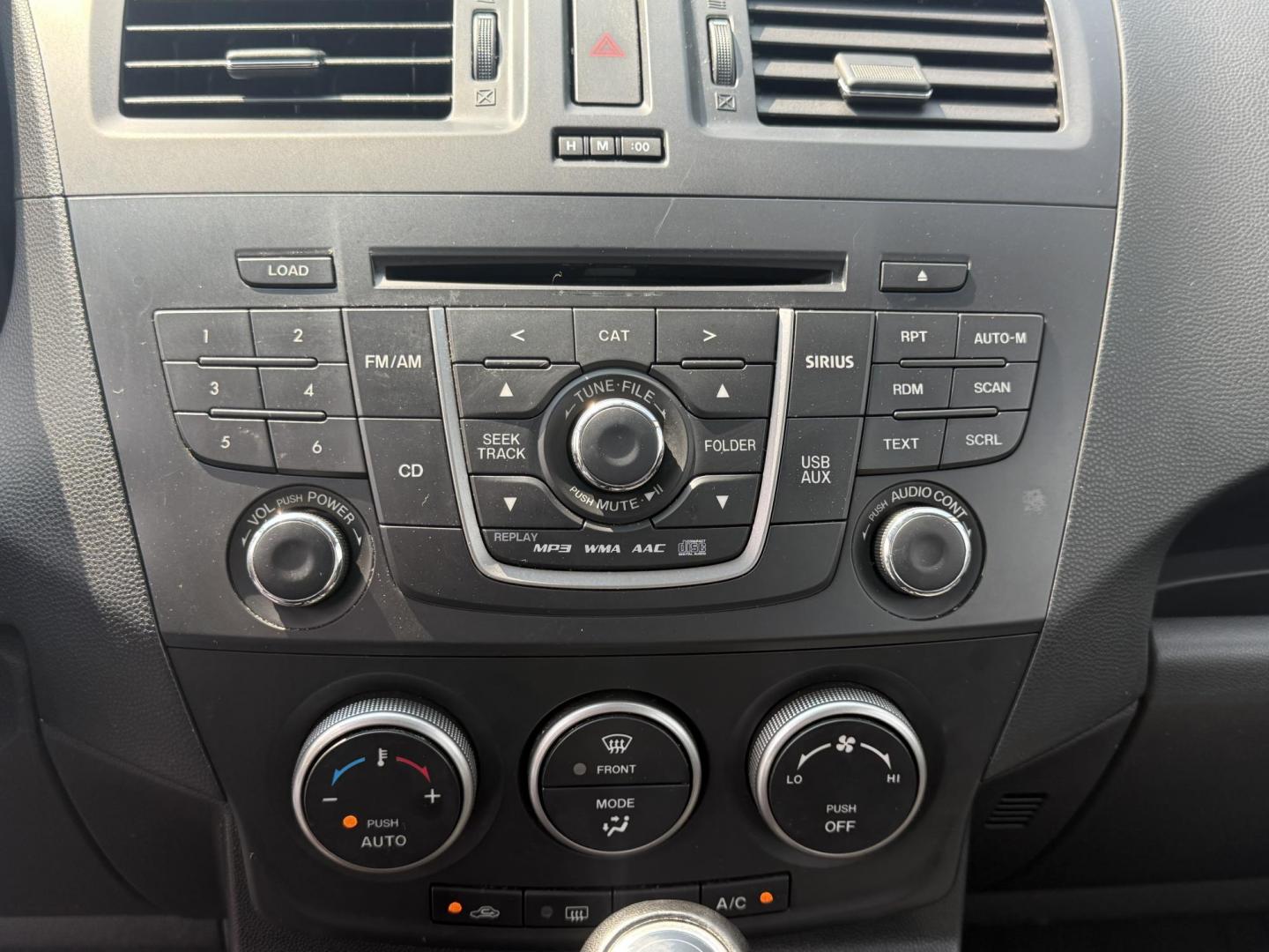 2015 Silver /Black Mazda MAZDA5 Grand Touring (JM1CW2DL0F0) with an 2.5L I4 DOHC 16V engine, 5-Speed Automatic transmission, located at 11115 Chardon Rd. , Chardon, OH, 44024, (440) 214-9705, 41.580246, -81.241943 - This 2015 Mazda Mazda 5 with a 2.5L I4 engine and 5-speed automatic transmission offers a versatile and comfortable minivan, achieving approximately 29 MPG highway. It features a leather interior, second-row captain’s seats, heated front seats, automatic climate control, a power moonroof, dusk-sen - Photo#24