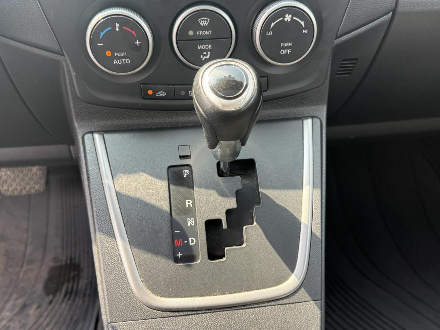 2015 Silver /Black Mazda MAZDA5 Grand Touring (JM1CW2DL0F0) with an 2.5L I4 DOHC 16V engine, 5-Speed Automatic transmission, located at 11115 Chardon Rd. , Chardon, OH, 44024, (440) 214-9705, 41.580246, -81.241943 - This 2015 Mazda Mazda 5 with a 2.5L I4 engine and 5-speed automatic transmission offers a versatile and comfortable minivan, achieving approximately 29 MPG highway. It features a leather interior, second-row captain’s seats, heated front seats, automatic climate control, a power moonroof, dusk-sen - Photo#25