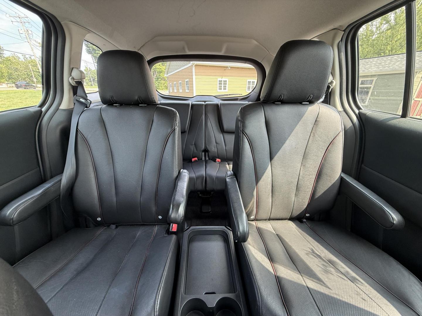 2015 Silver /Black Mazda MAZDA5 Grand Touring (JM1CW2DL0F0) with an 2.5L I4 DOHC 16V engine, 5-Speed Automatic transmission, located at 11115 Chardon Rd. , Chardon, OH, 44024, (440) 214-9705, 41.580246, -81.241943 - This 2015 Mazda Mazda 5 with a 2.5L I4 engine and 5-speed automatic transmission offers a versatile and comfortable minivan, achieving approximately 29 MPG highway. It features a leather interior, second-row captain’s seats, heated front seats, automatic climate control, a power moonroof, dusk-sen - Photo#29