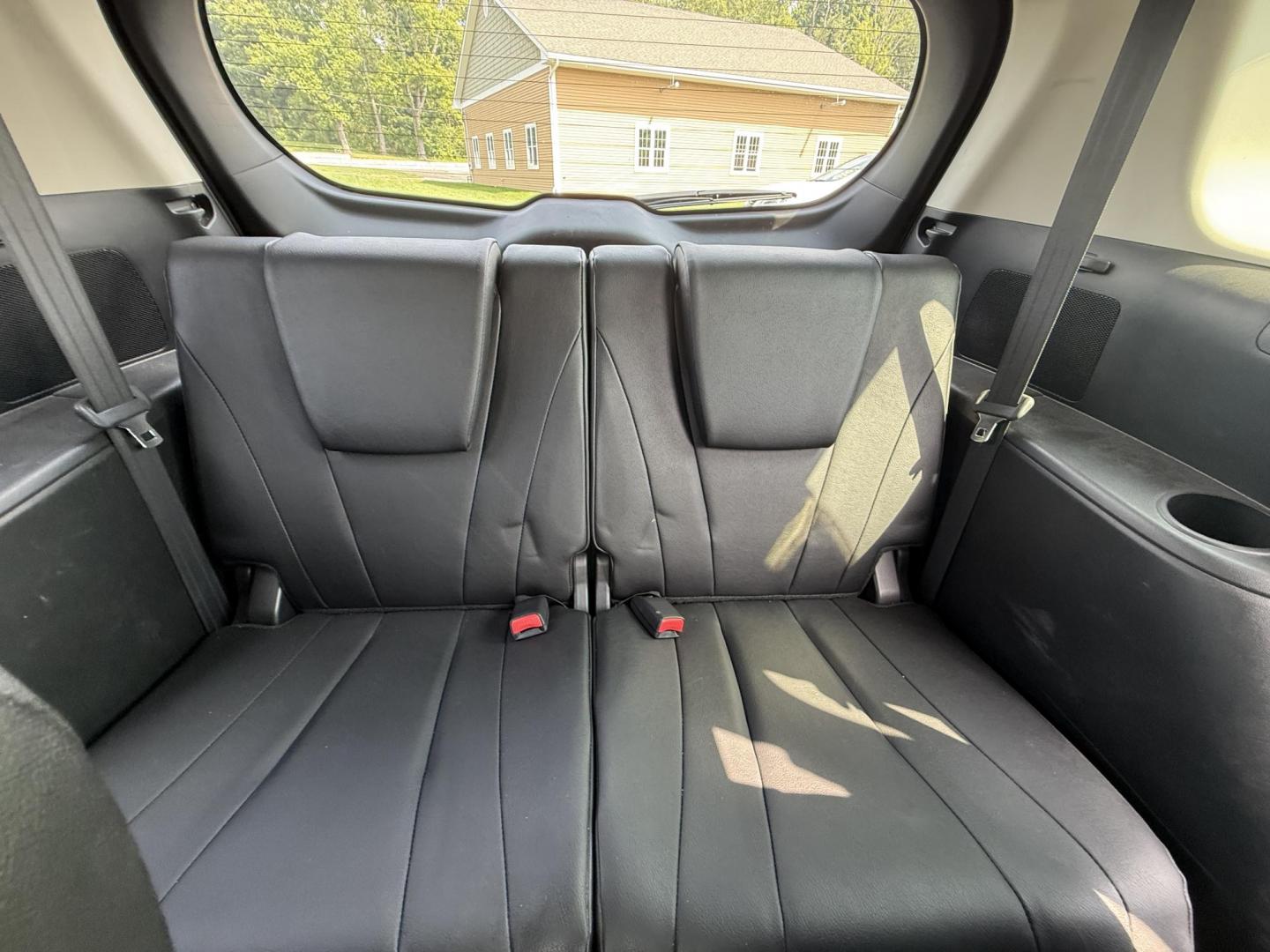 2015 Silver /Black Mazda MAZDA5 Grand Touring (JM1CW2DL0F0) with an 2.5L I4 DOHC 16V engine, 5-Speed Automatic transmission, located at 11115 Chardon Rd. , Chardon, OH, 44024, (440) 214-9705, 41.580246, -81.241943 - This 2015 Mazda Mazda 5 with a 2.5L I4 engine and 5-speed automatic transmission offers a versatile and comfortable minivan, achieving approximately 29 MPG highway. It features a leather interior, second-row captain’s seats, heated front seats, automatic climate control, a power moonroof, dusk-sen - Photo#31